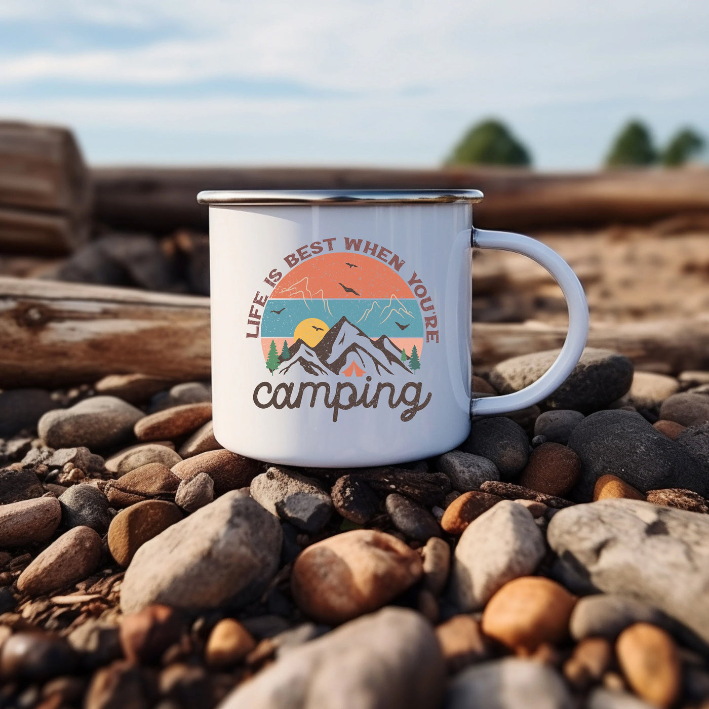 a white coffee mug sitting on top of a pile of rocks