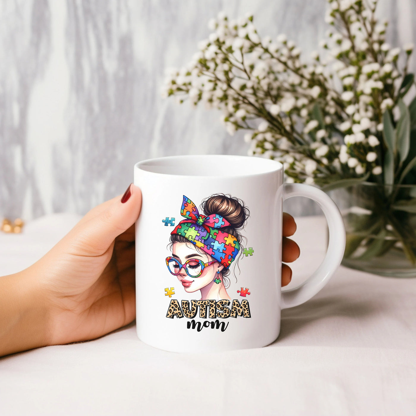 a person holding a coffee mug with a picture of a woman wearing glasses