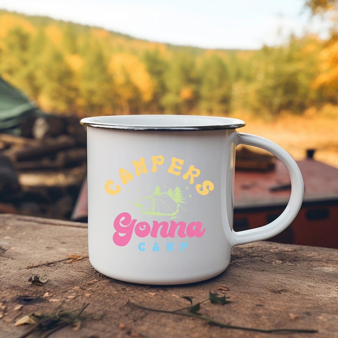 a camper's mug sitting on top of a wooden table