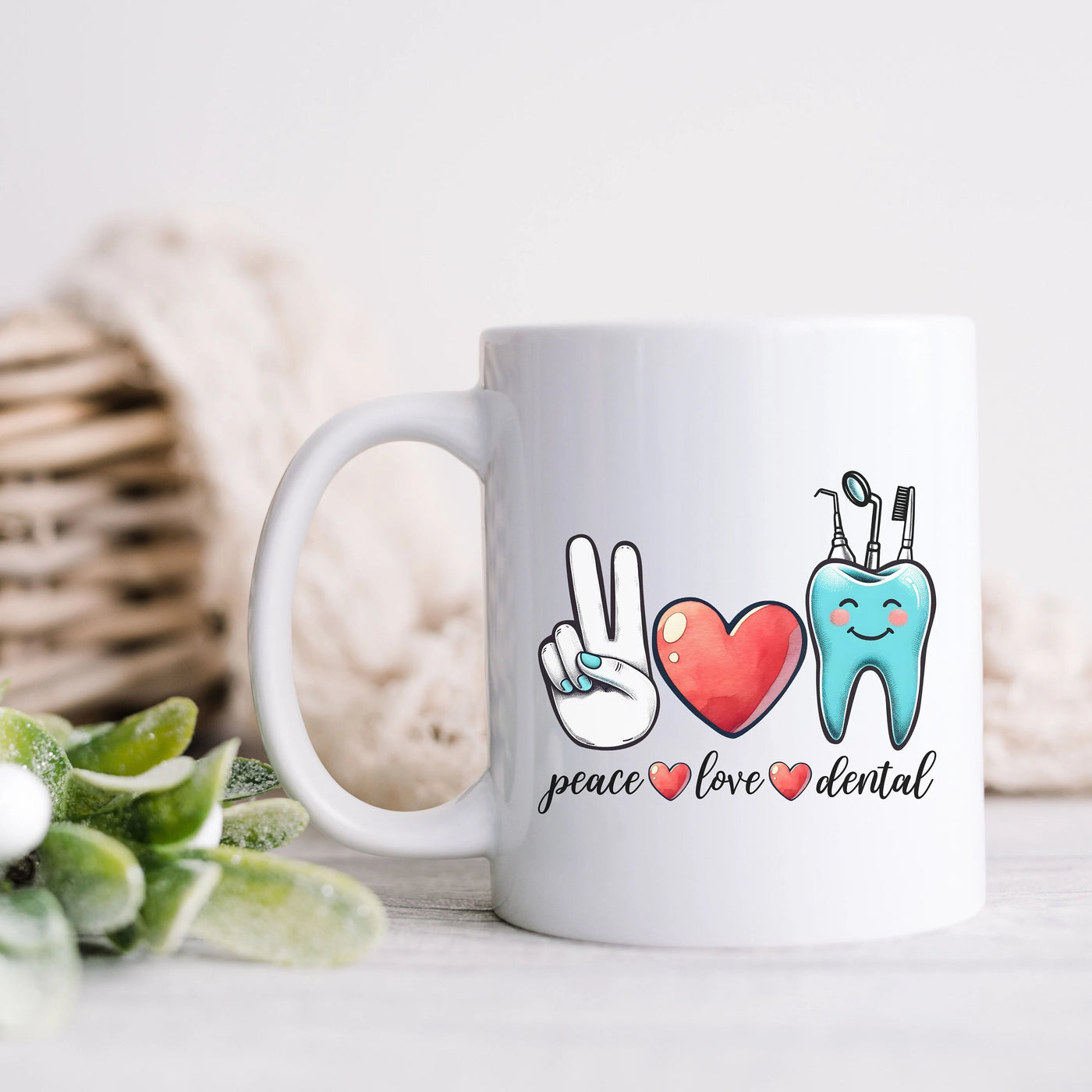 a coffee mug with a tooth and a heart on it