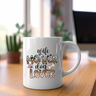 a white coffee mug sitting on top of a wooden table