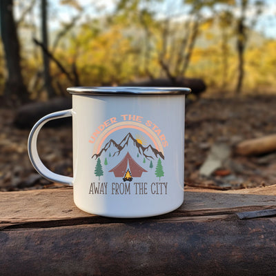 a camp mug sitting on a piece of wood