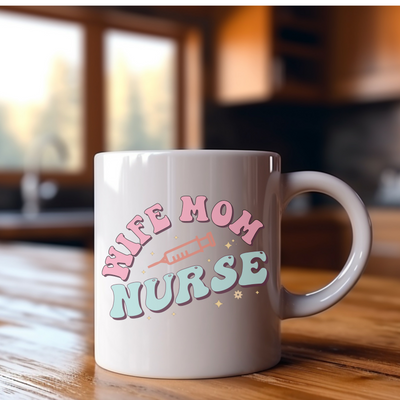 a white coffee mug sitting on top of a wooden table