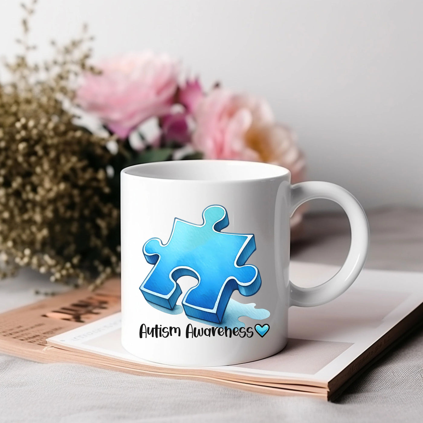 a white coffee mug with a blue puzzle piece on it