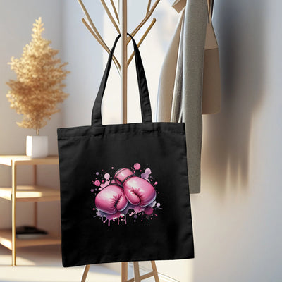 a black bag with pink boxing gloves on it