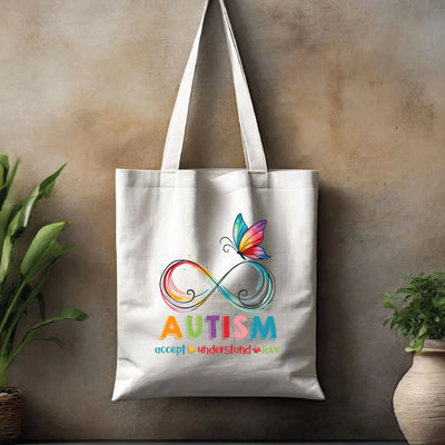 a white tote bag with a butterfly on it