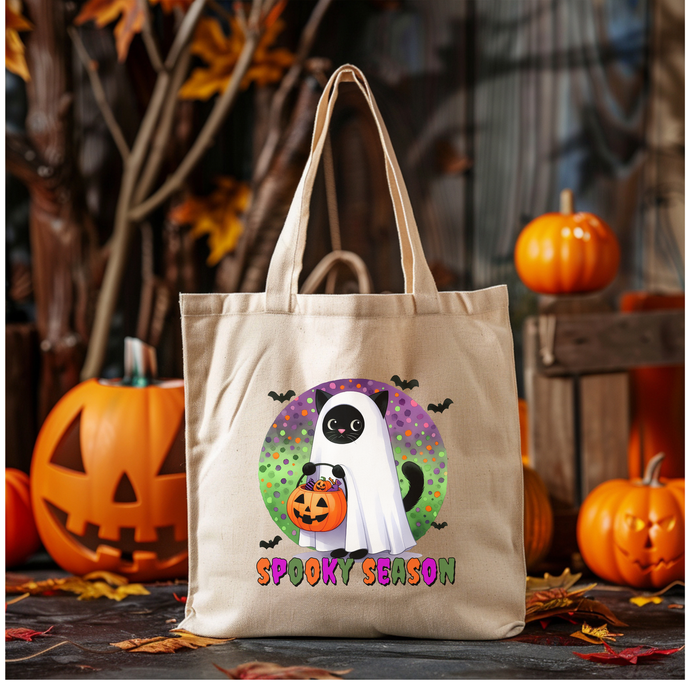 a trick or treat bag with a ghost holding a pumpkin