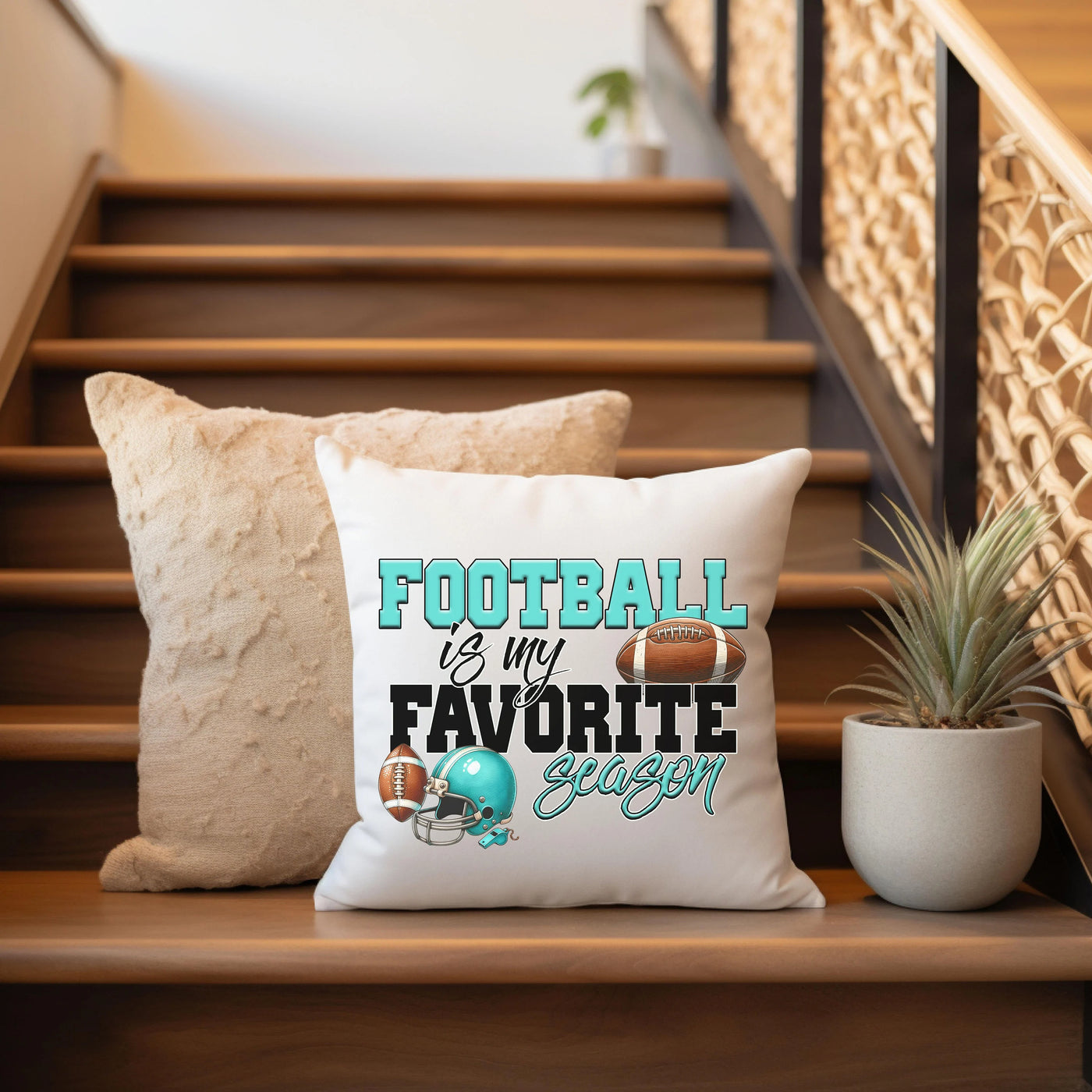 a football pillow sitting on top of a wooden banister