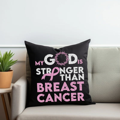 a couch with a pillow that says, my god is stronger than breast cancer