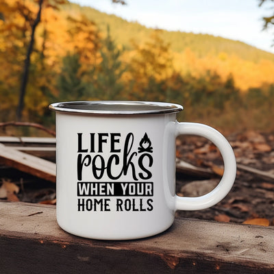 a white coffee mug sitting on top of a wooden table