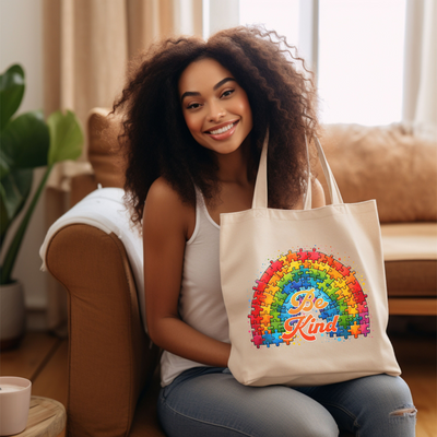 a woman sitting on a couch holding a tote bag