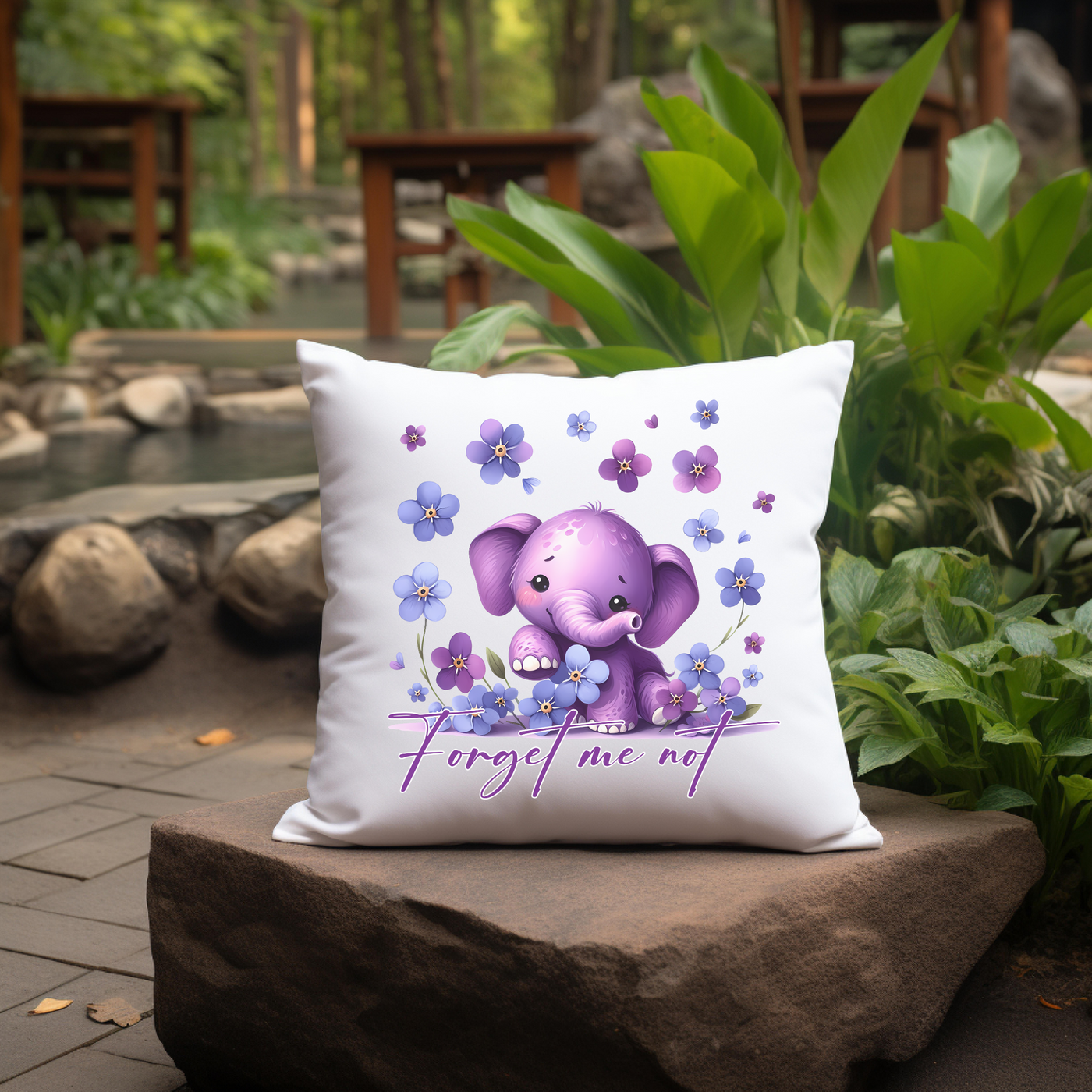 a pillow with a picture of an elephant on it