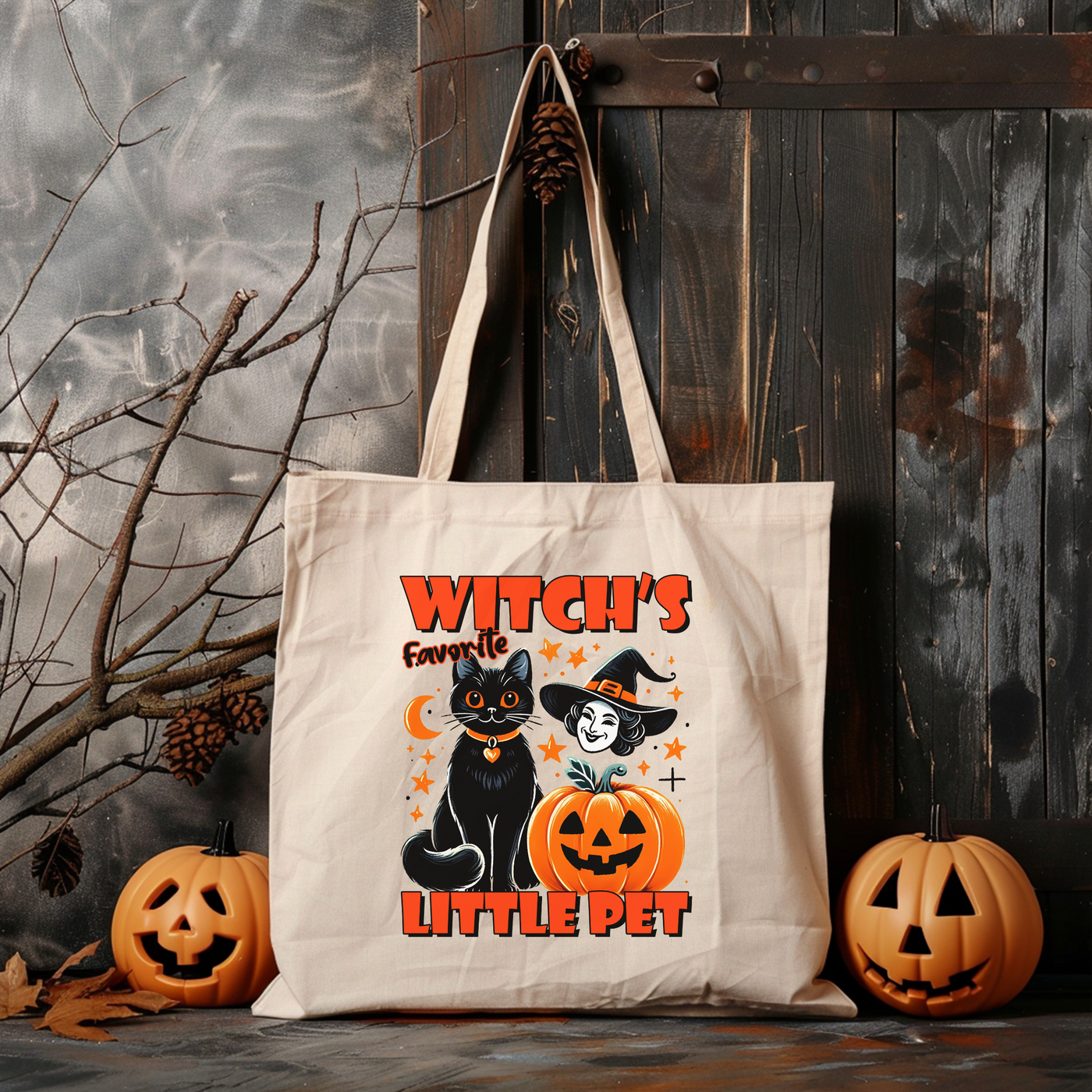 a tote bag with a black cat and a witch on it