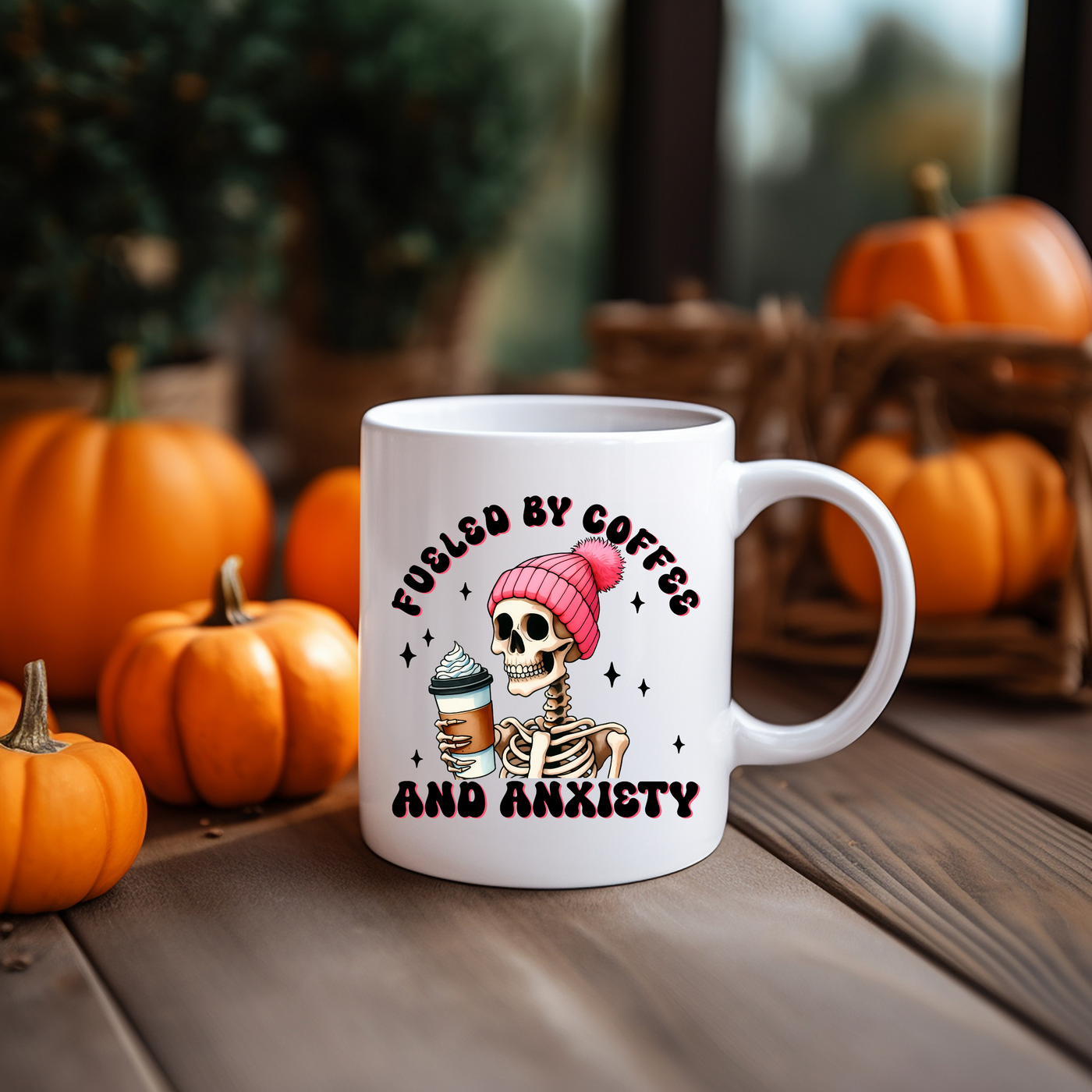 a coffee mug with a skeleton holding a cup of coffee