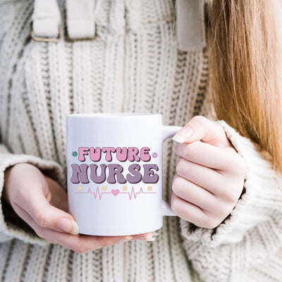 a woman holding a coffee mug with the words future nurse on it