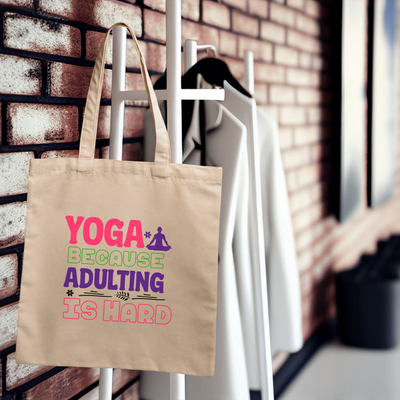 a yoga bag hanging on a rack next to a brick wall