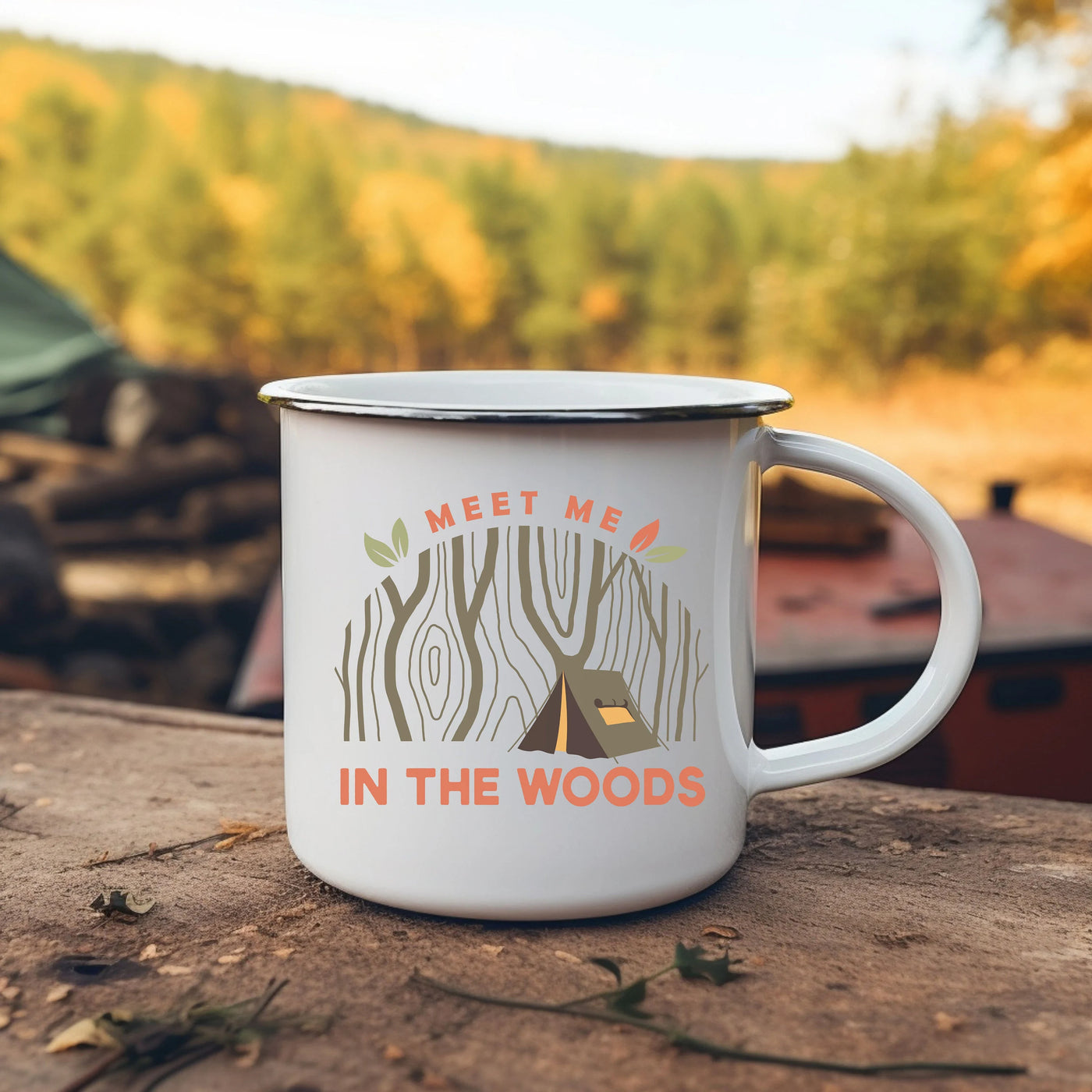 a camper mug sitting on top of a wooden table