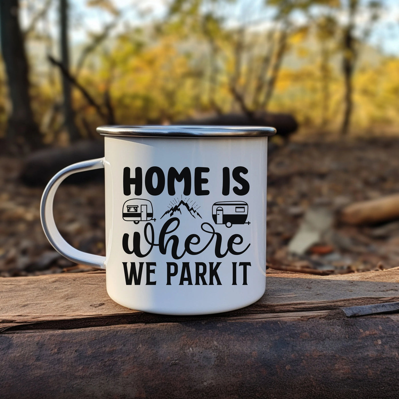 a camper mug sitting on top of a log