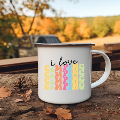 a white coffee mug sitting on top of a wooden table