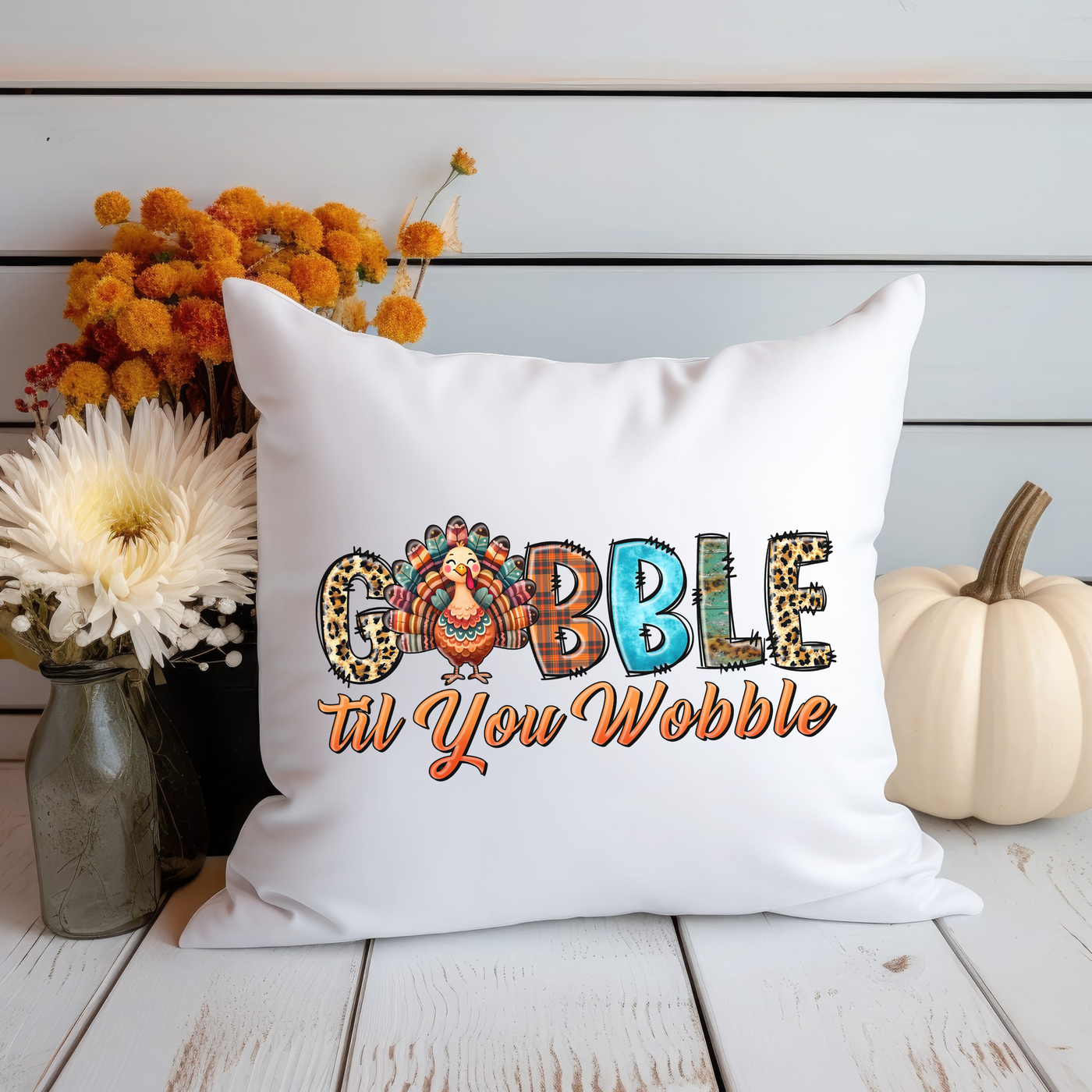 a white pillow with the word gobble on it