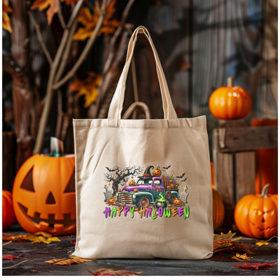 a tote bag with a picture of a truck and pumpkins