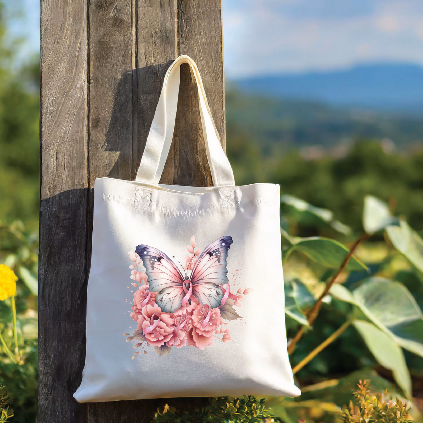 a white tote bag hanging from a wooden pole