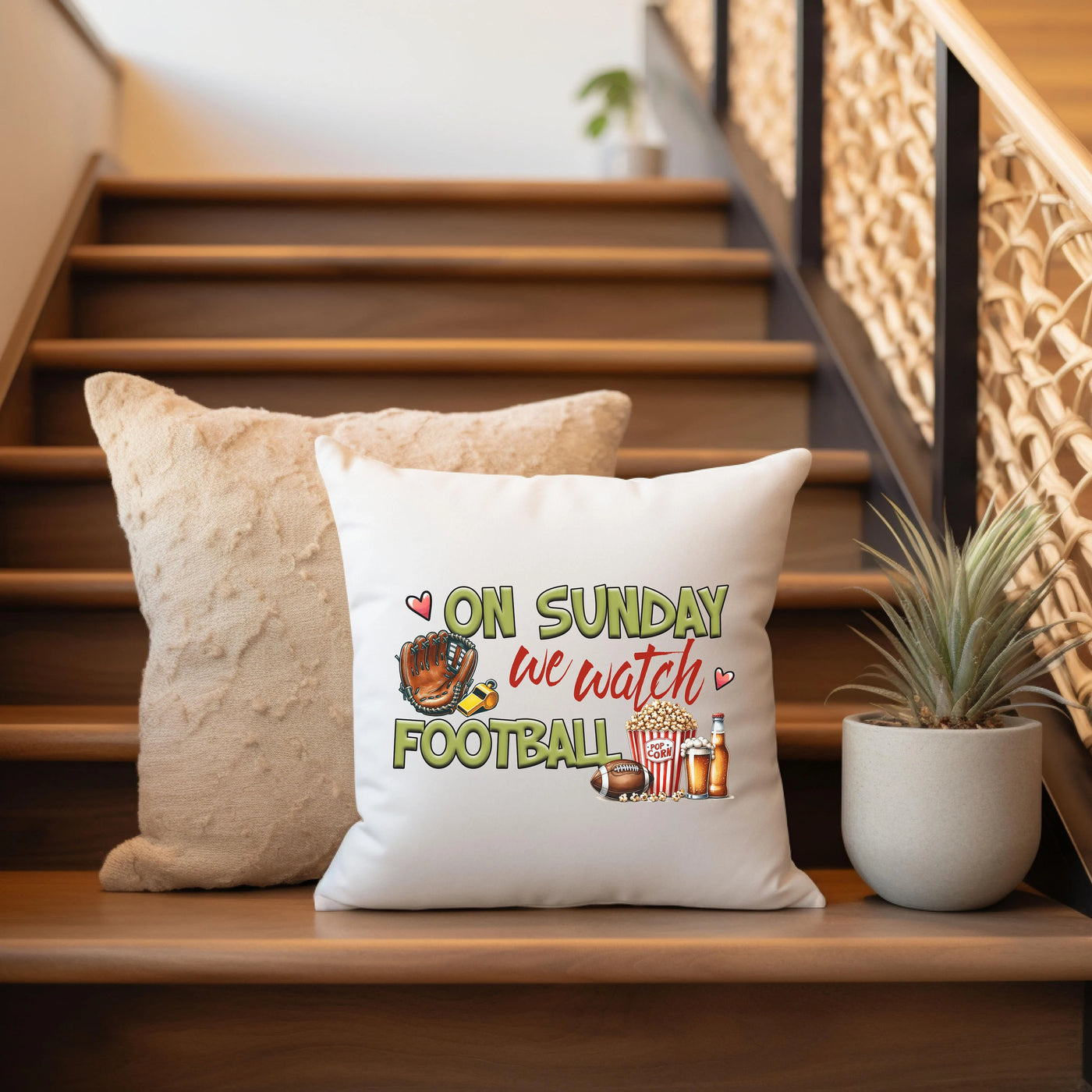 a white pillow sitting on top of a wooden banister