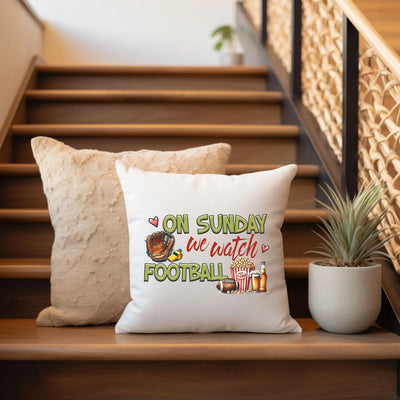 a white pillow sitting on top of a wooden banister