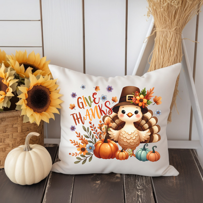 a white pillow with a thanksgiving turkey on it