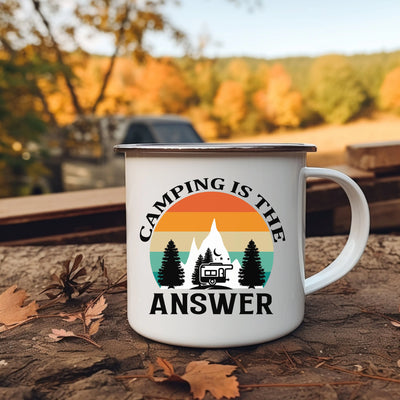 a camping is the answer coffee mug sitting on the ground