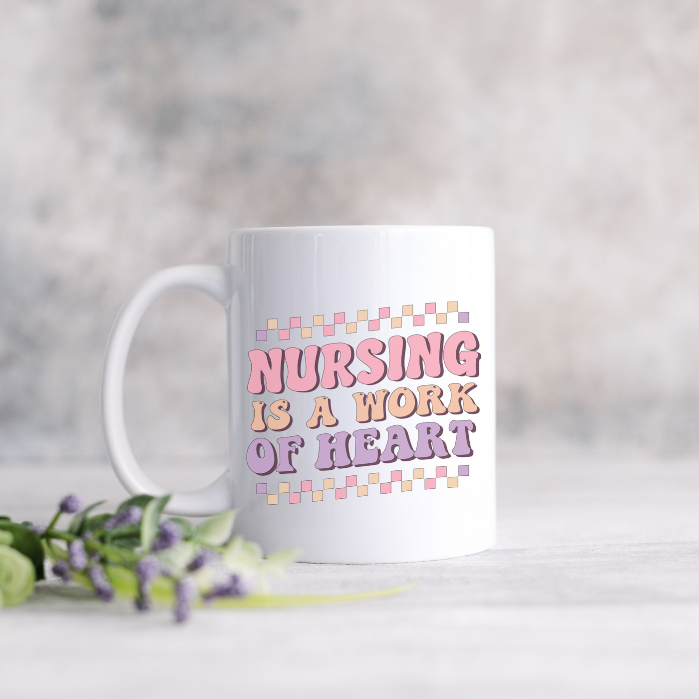 a white coffee mug with the words nursing is a work of heart