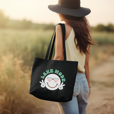 a woman wearing a hat and carrying a black tote bag