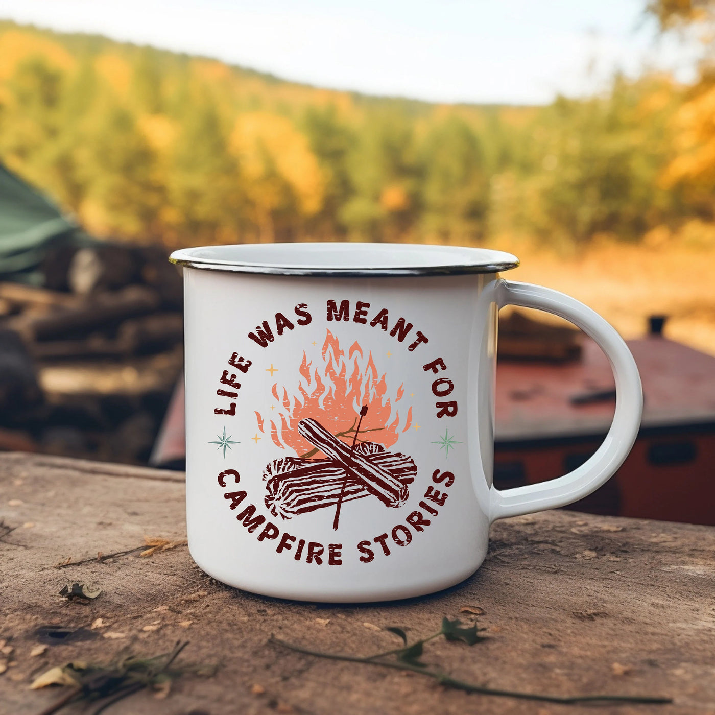 a campfire mug sitting on top of a wooden table