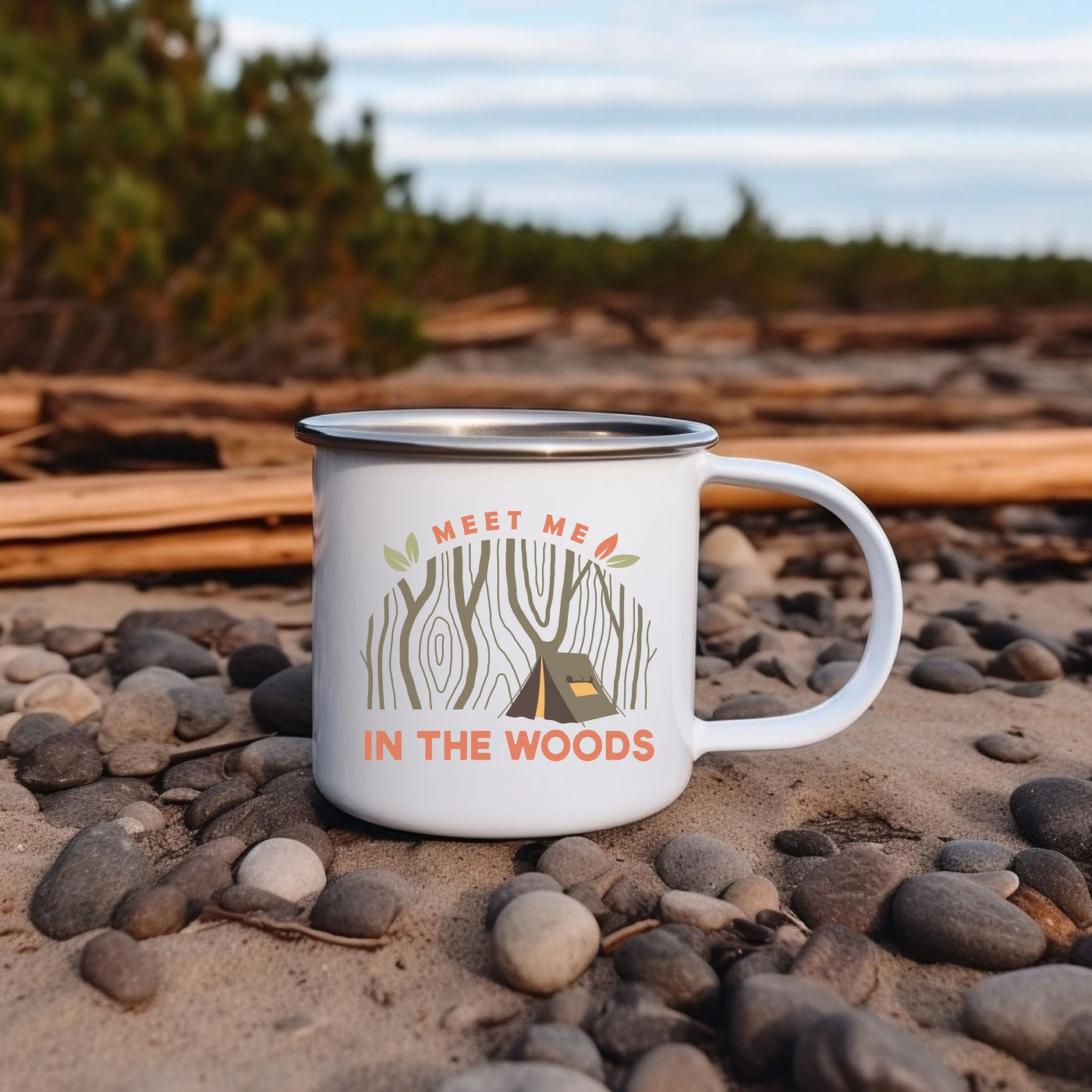 a white coffee cup sitting on top of a pile of rocks