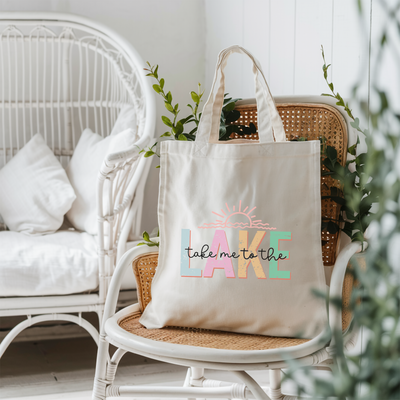 a tote bag sitting on top of a chair next to a potted plant