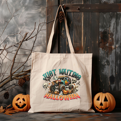 a tote bag with a monster truck on it