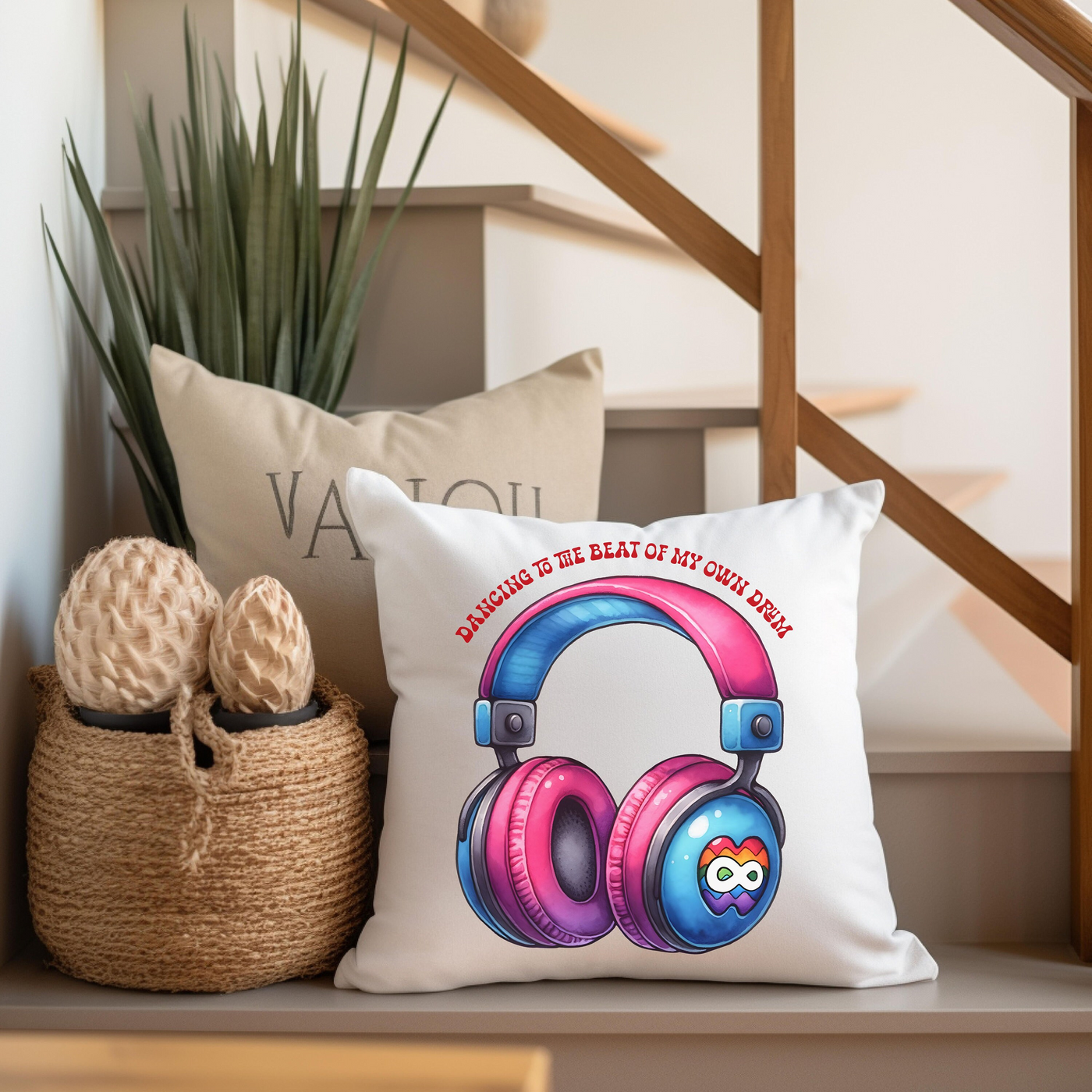 a pair of headphones sitting on top of a pillow