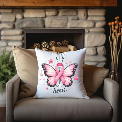 a pillow with a pink butterfly on it