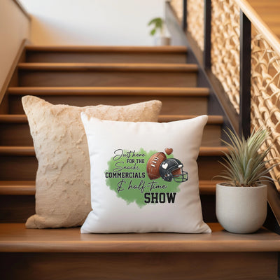 a white pillow sitting on top of a wooden banister