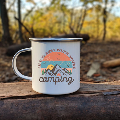 a white coffee mug sitting on top of a piece of wood