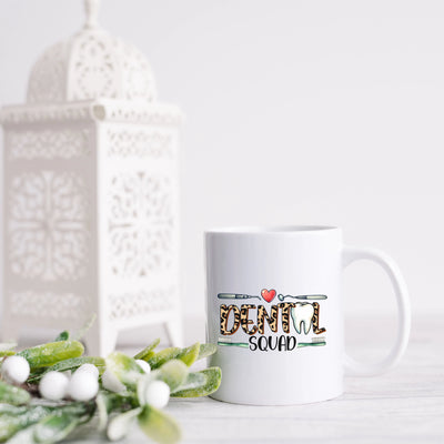 a white coffee mug sitting on top of a table