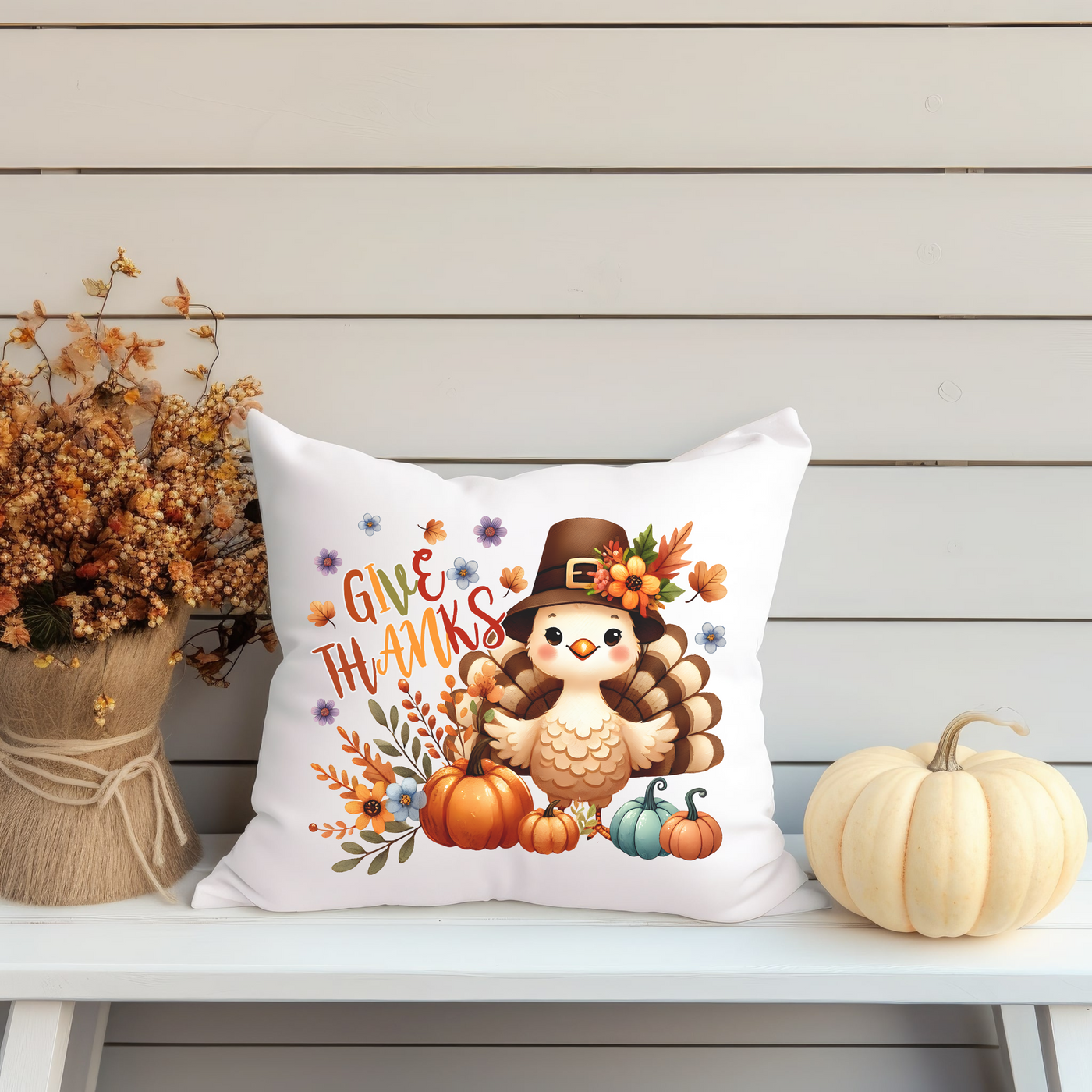 a white pillow with a thanksgiving turkey on it