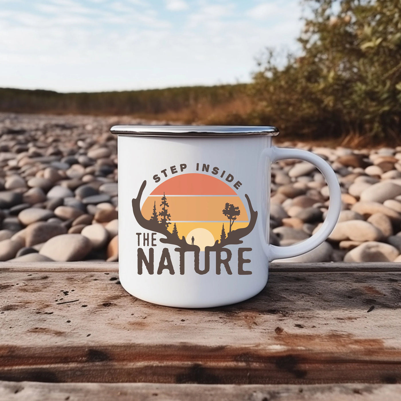 a white coffee mug sitting on top of a wooden table