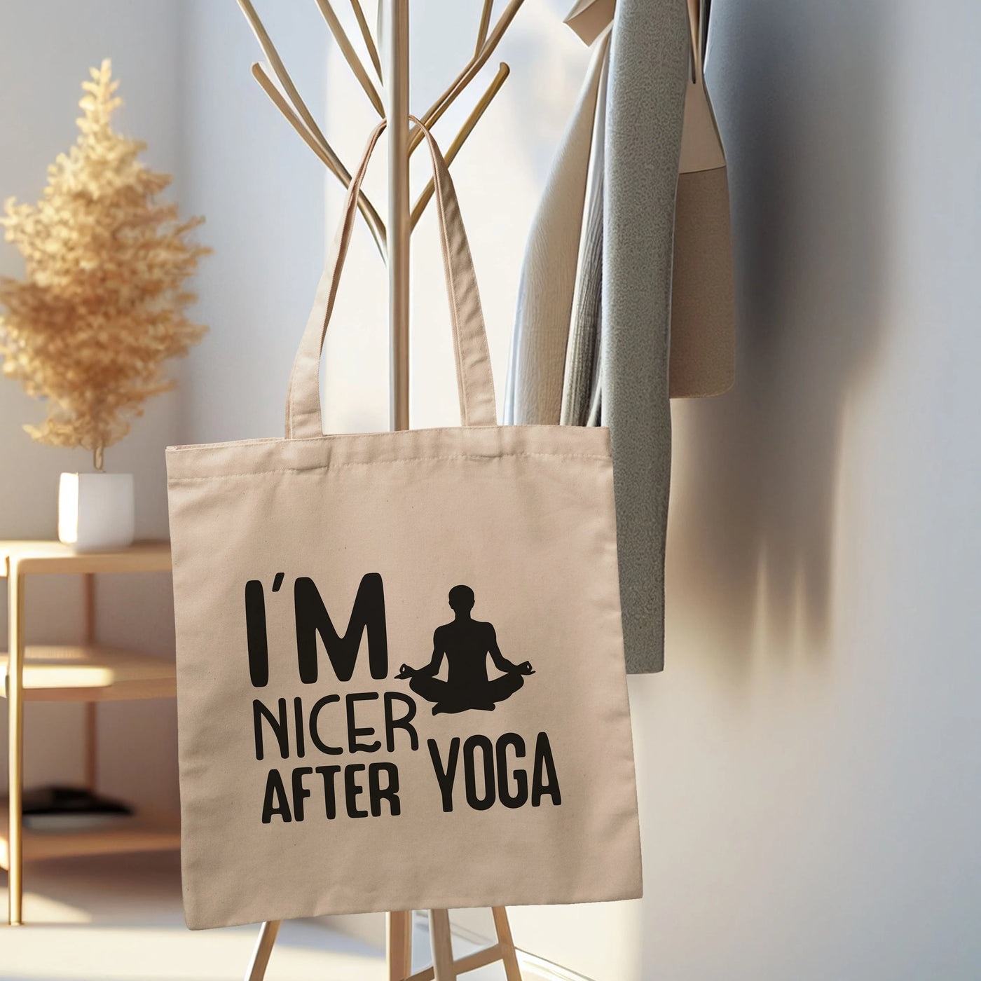 a tote bag that says i'm nicer after yoga