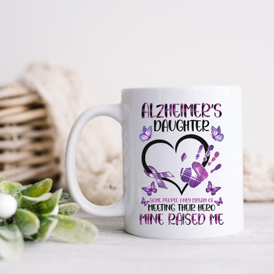 a white coffee mug with a purple heart on it