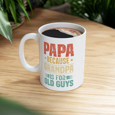 a cup of coffee sitting on top of a wooden table