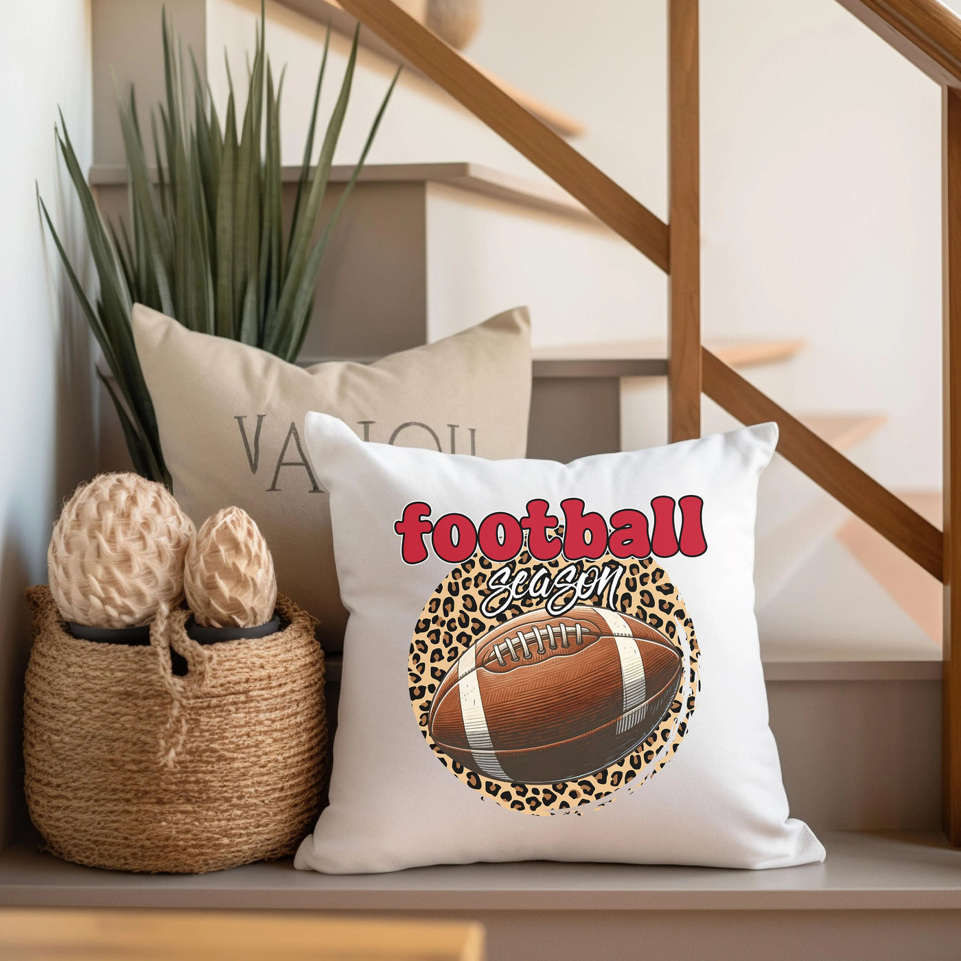 a football pillow sitting on top of a wooden shelf