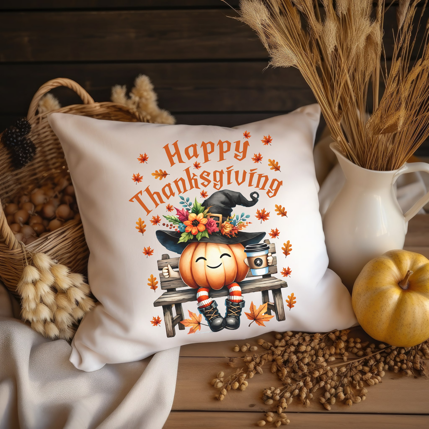 a white pillow with a happy thanksgiving pumpkin on it