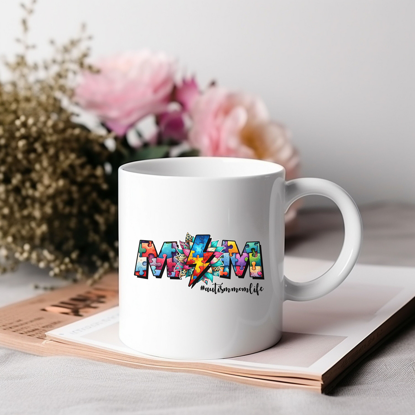 a white coffee mug sitting on top of a table