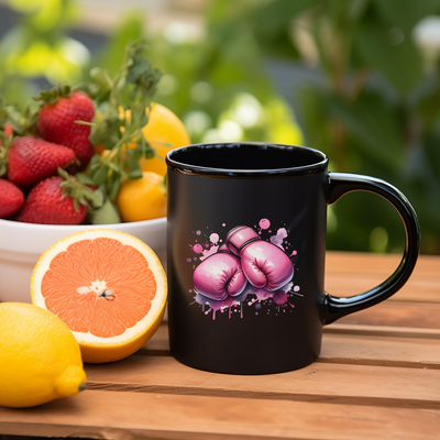 a close up of a coffee cup near a bowl of fruit